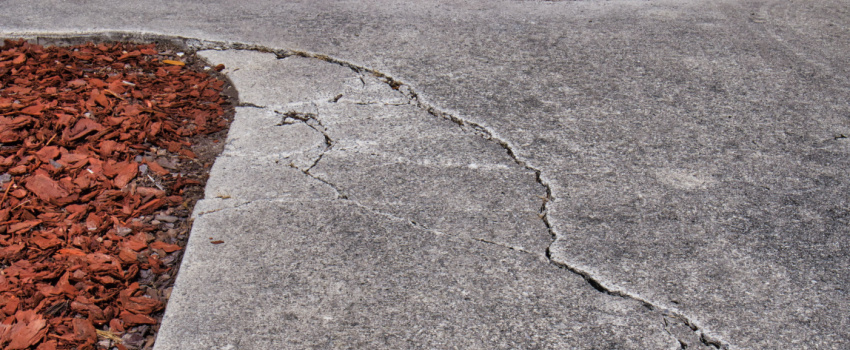 how to fix sunken asphalt driveway